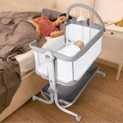 Baby Bassinet Bedside Sleeper with Storage Basket,Wheels & Hanging Toys