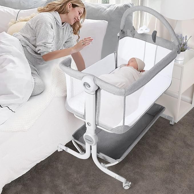 Baby Bassinet Bedside Sleeper with Storage Basket,Wheels & Hanging Toys