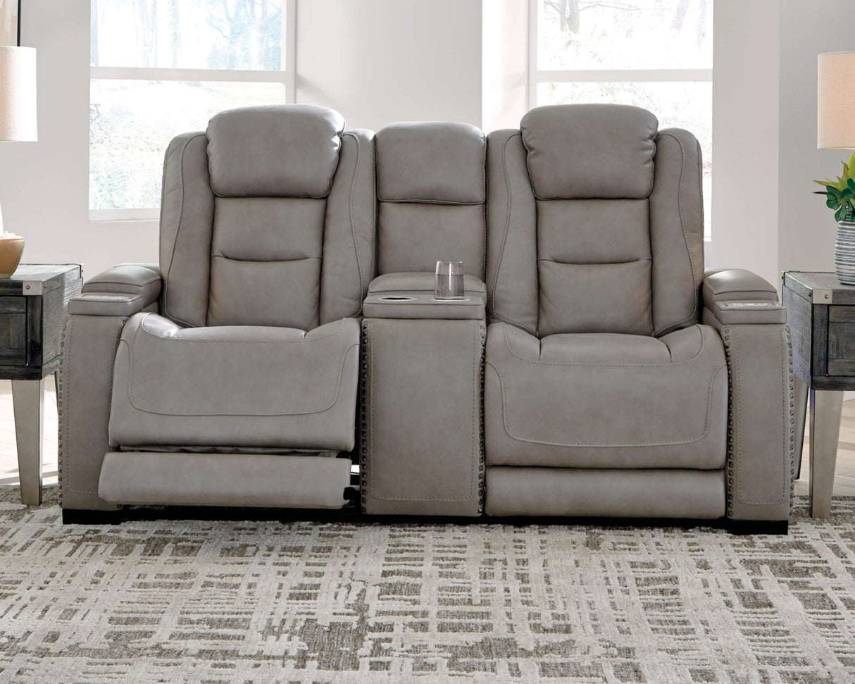 The Man-Den Leather Power Reclining Loveseat with Center Console, Adjustable Headrest