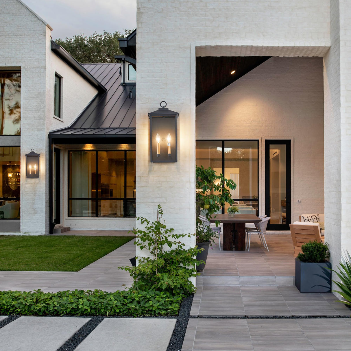 18 Inch Wall Light in Clear Glass and Textured Black and Golden Candle Cap Sleeve