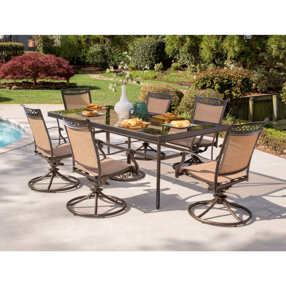 Fontana 7-Piece Outdoor Dining Set with Six Sling Swivel Rockers and an Extra Large Glass-top Dining Table