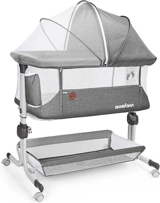 Portable Momfann baby bassinet being folded for travel