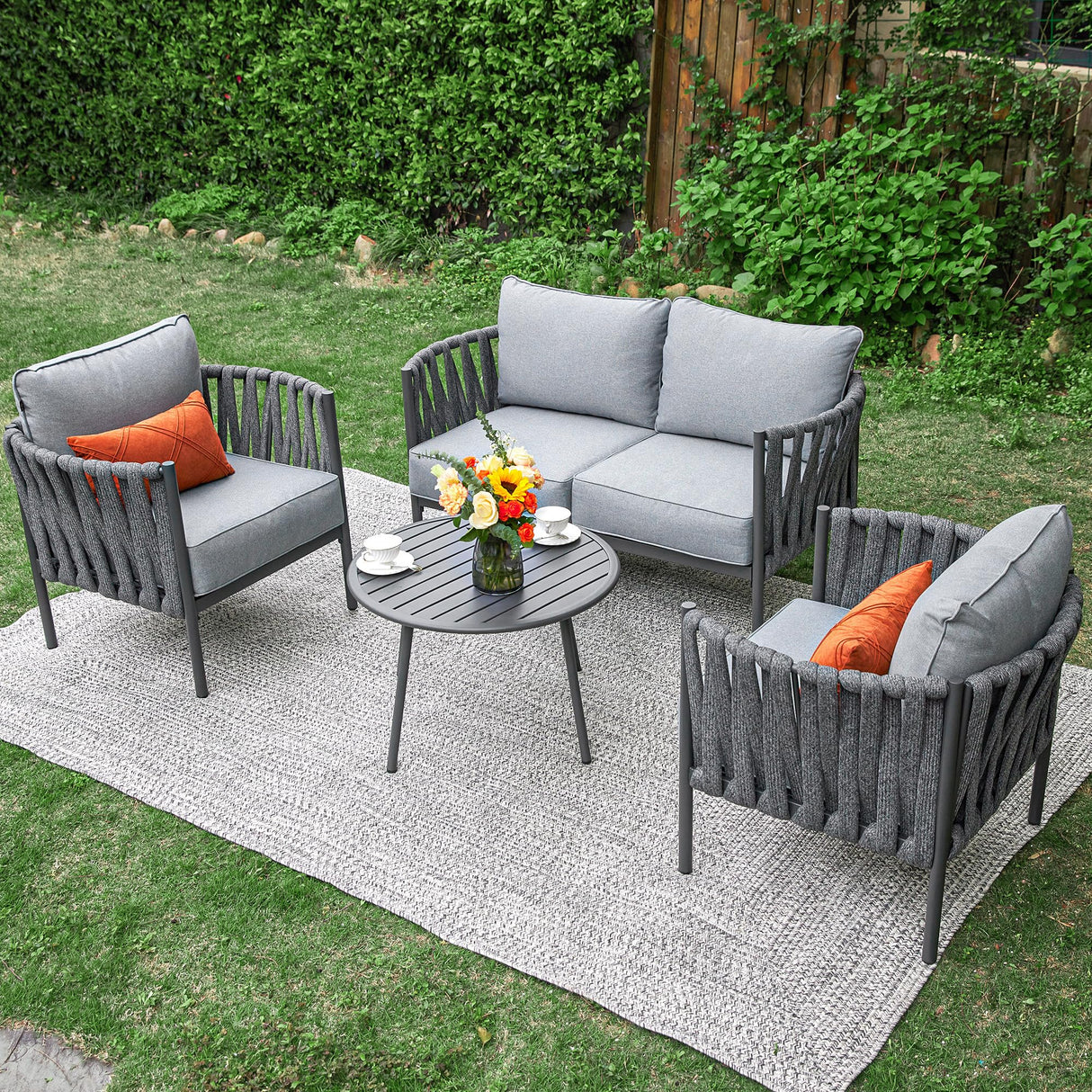 Top-down view of 4-piece outdoor set in grey setup on patio