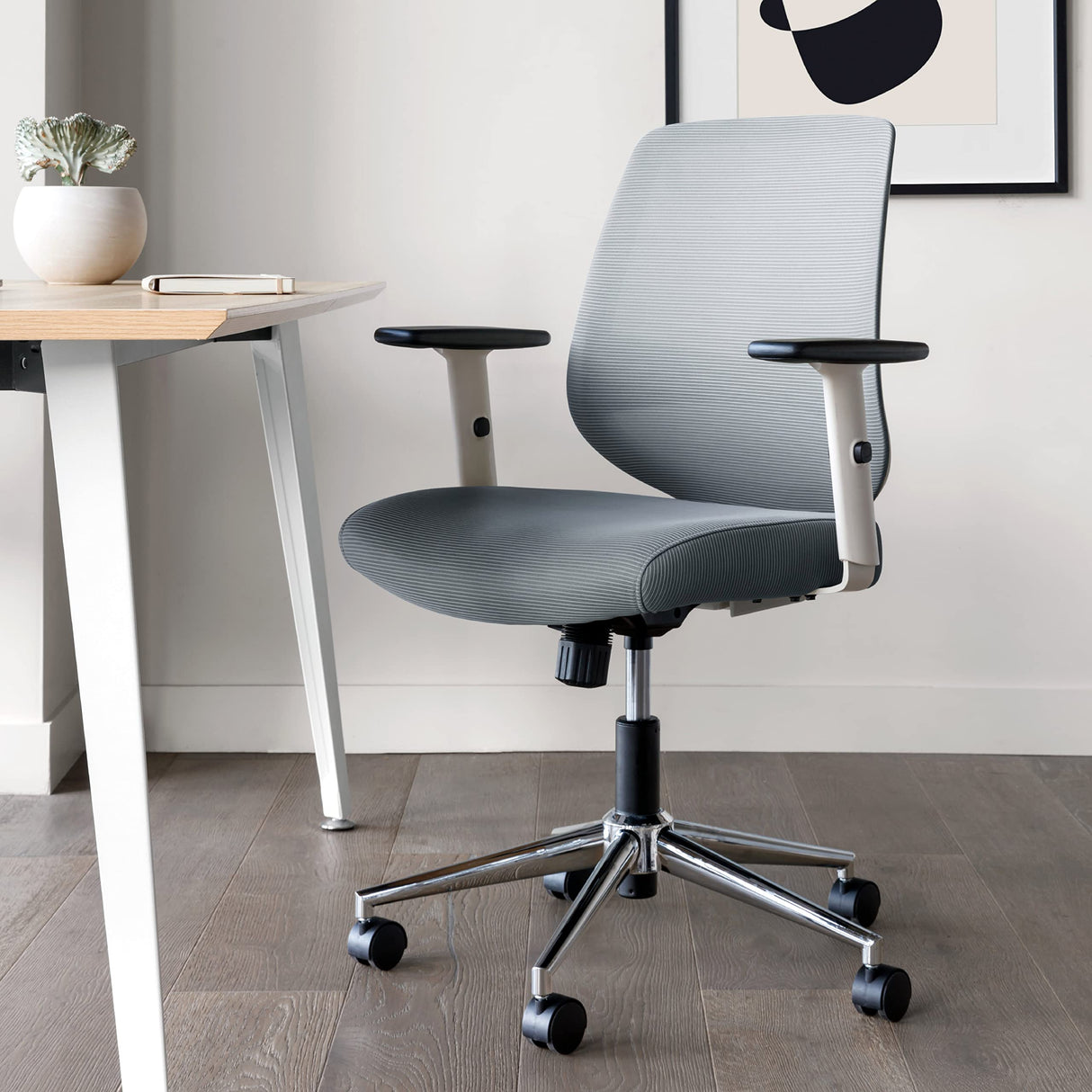 Modern desk chair with tilt and height adjustment features