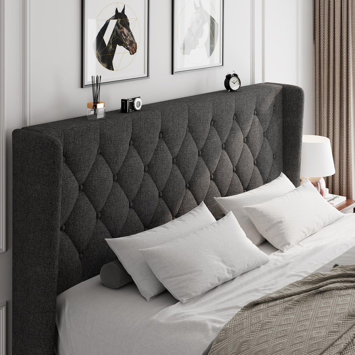 Elegant king-size bed with tall, tufted upholstered headboard in dark fabric