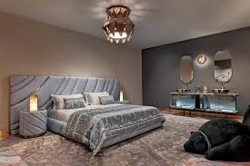 Affordable furniture at the best prices in the USA featuring luxury gray upholstered bed with modern nightstands and statement lighting