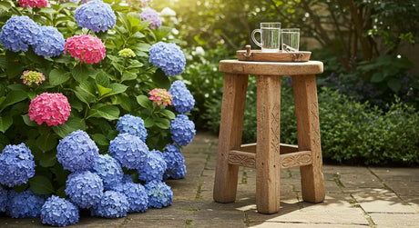Wooden outdoor bar stools on a patio with natural sunlight, perfect for backyard bars and outdoor seating areas.