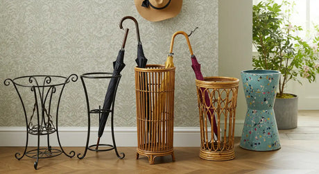 Modern white umbrella stand placed near a doorway, holding umbrellas and plastic bags. A stylish and functional storage solution for any entryway.