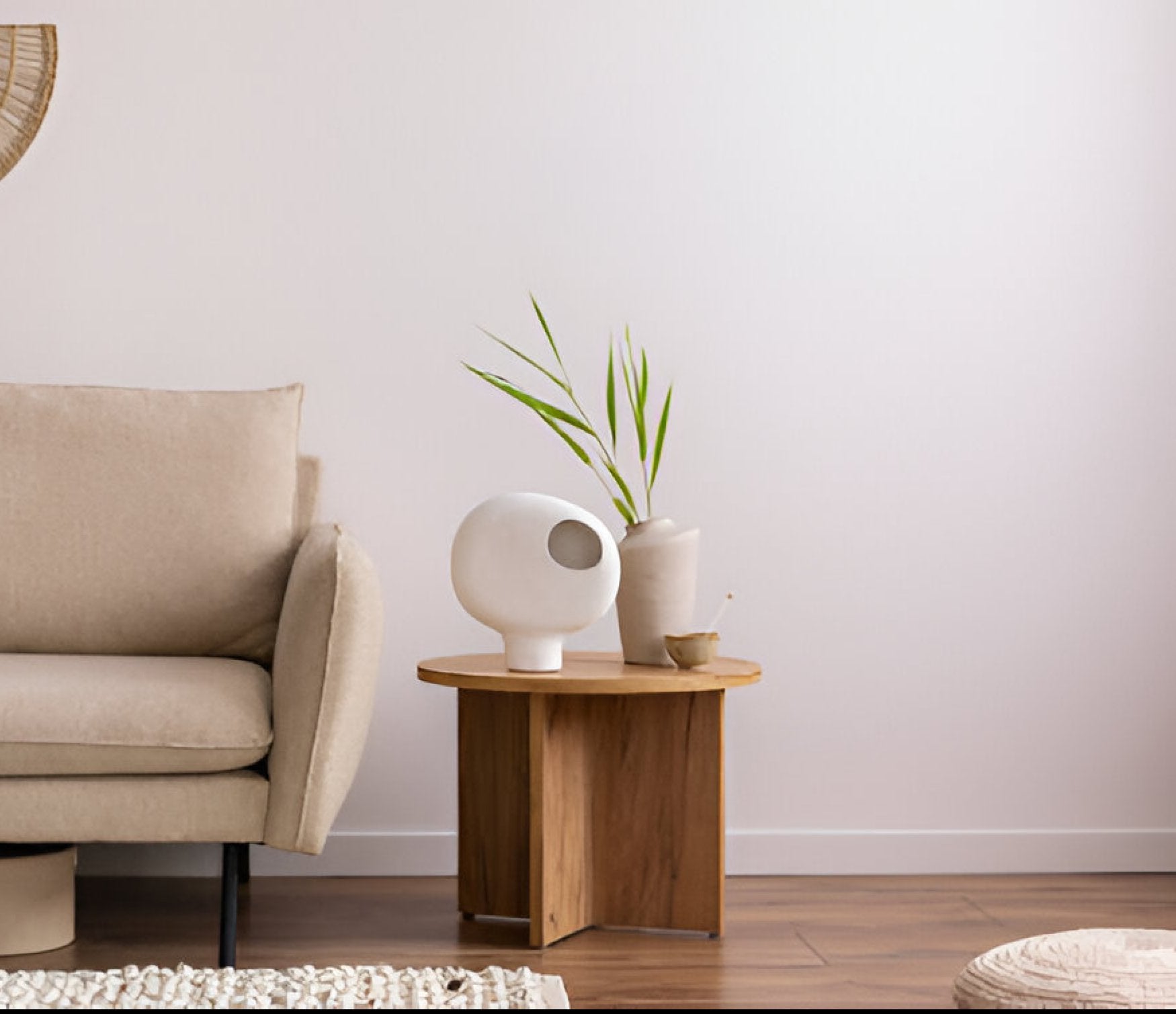 living room with a modern solid wood coffee table beside a neutral sofa.
