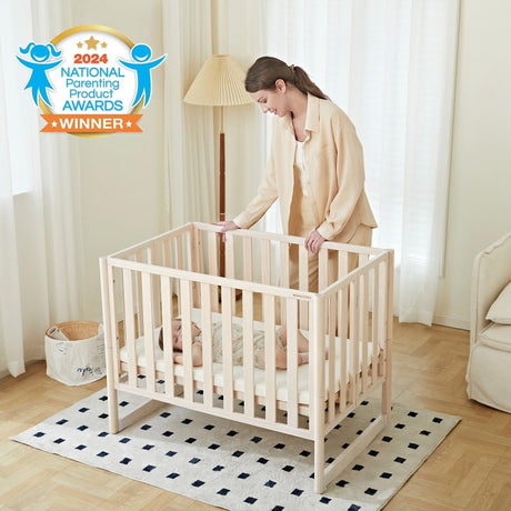 MAMAZING EvoNook 7-in-1 Convertible Mini Crib - Easy Assembly, Portable Folding Baby Mini Crib with Mattress, 100% New Zealand Pinewood, 4 Adjustable Mattress Heights, Washed White