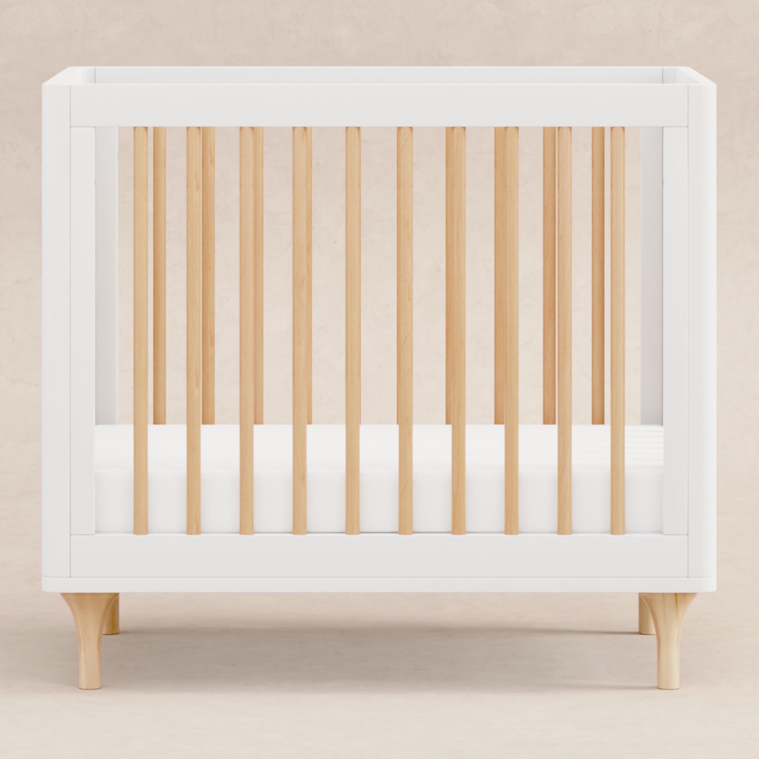 Lolly 4-in-1 Convertible Mini Crib and Twin Bed with Toddler Bed Conversion Kit in White