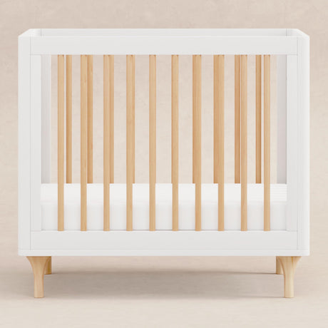 Lolly 4-in-1 Convertible Mini Crib and Twin Bed with Toddler Bed Conversion Kit in White