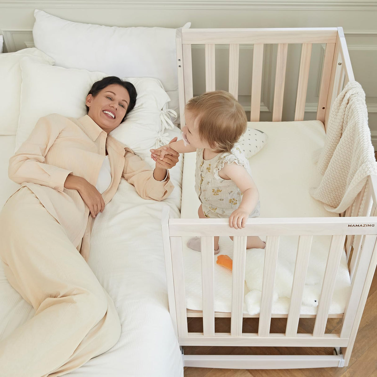 MAMAZING EvoNest Baby Crib, 6 in 1 Convertible Mini Crib with Wheels, 100% New Zealand Pinewood Growing Bed, 4 Adjustable Mattress Heights,Walnut Brown (Washed Natural)