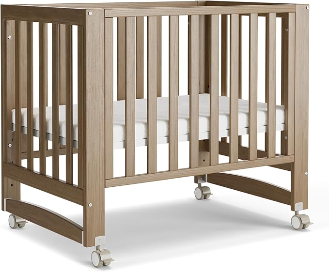 EvoNest Baby Crib, 6 in 1 Convertible Mini Crib with Wheels