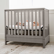 5-in-1 Convertible Mini Crib with 2.75'' Bonus Thick Mattress with Water-Resistant Cover