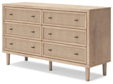 Signature Design by Ashley Cielden Coastal 6-Drawer Dresser with Safety Stop and Textured Cane Details, Light Brown