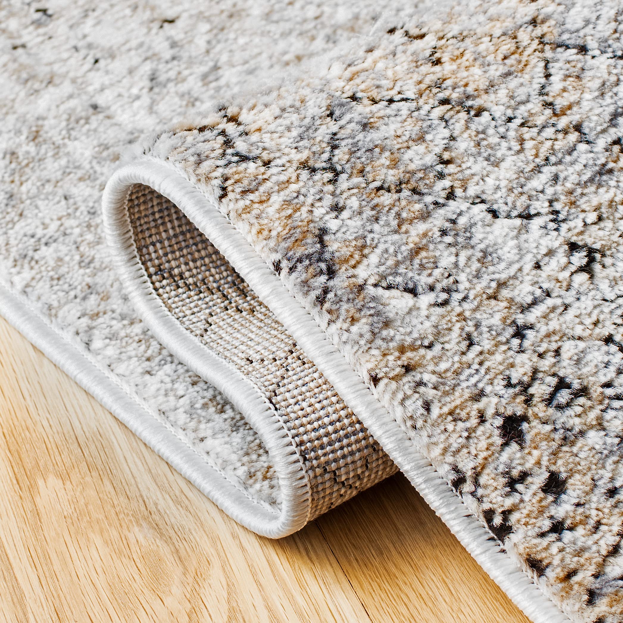 SAFAVIEH Amelia Collection Area Rug - 10' x 14', Grey & Gold, Rustic Tribal Distressed Design, Non-Shedding & Easy Care, Ideal for High Traffic Areas in Living Room, Bedroom (ALA761H)