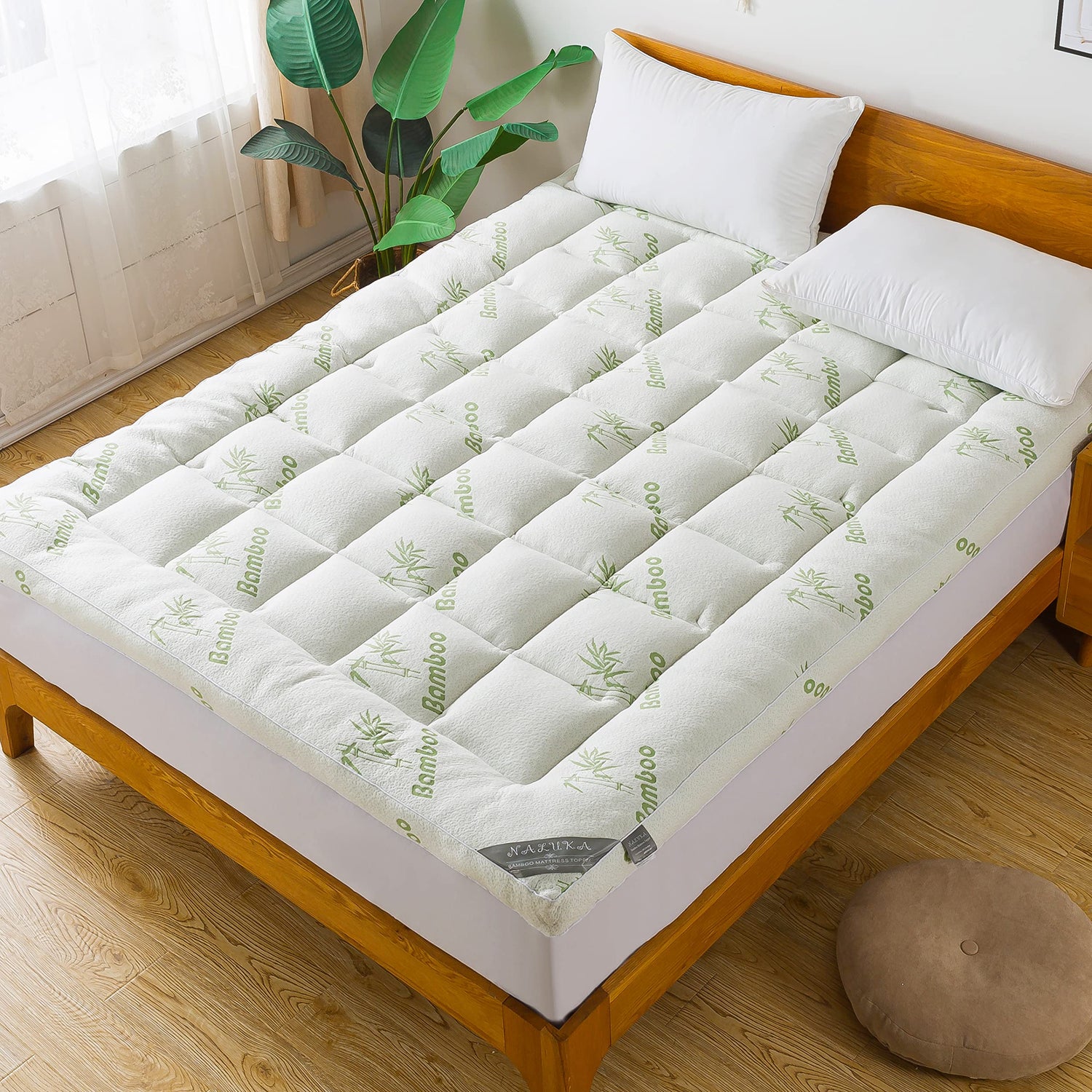 Bamboo viscose 3-inch cooling mattress topper on bed