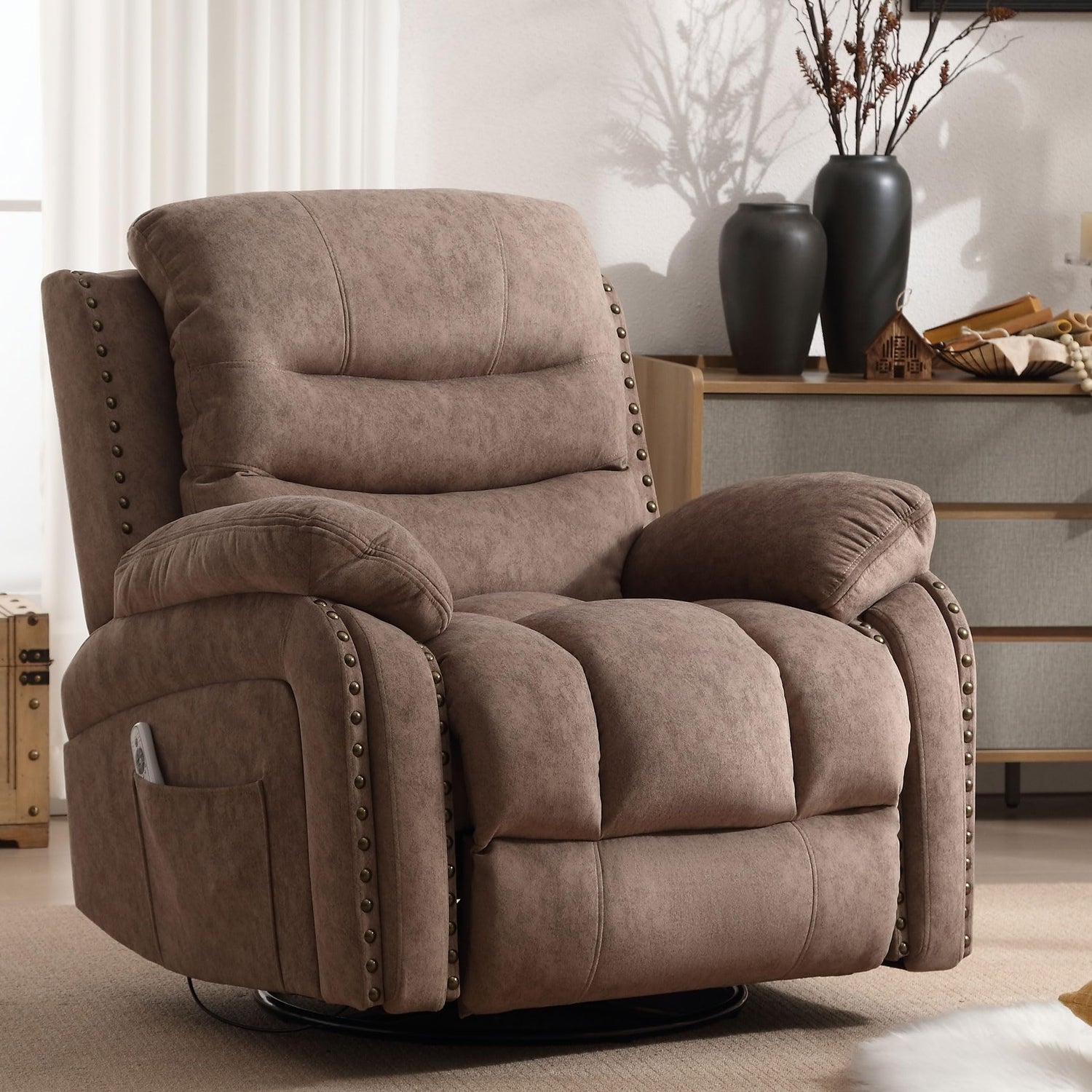 Brown swivel rocker recliner with massage zones and cup holder