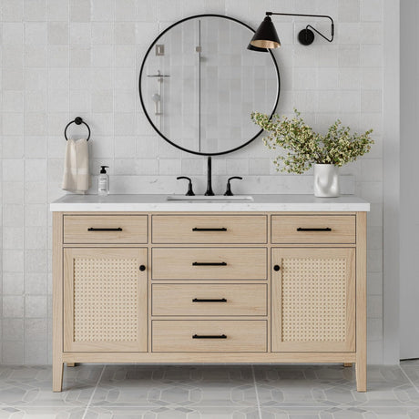 Front view of Ariel white oak bathroom vanity with rattan door accents and quartz top