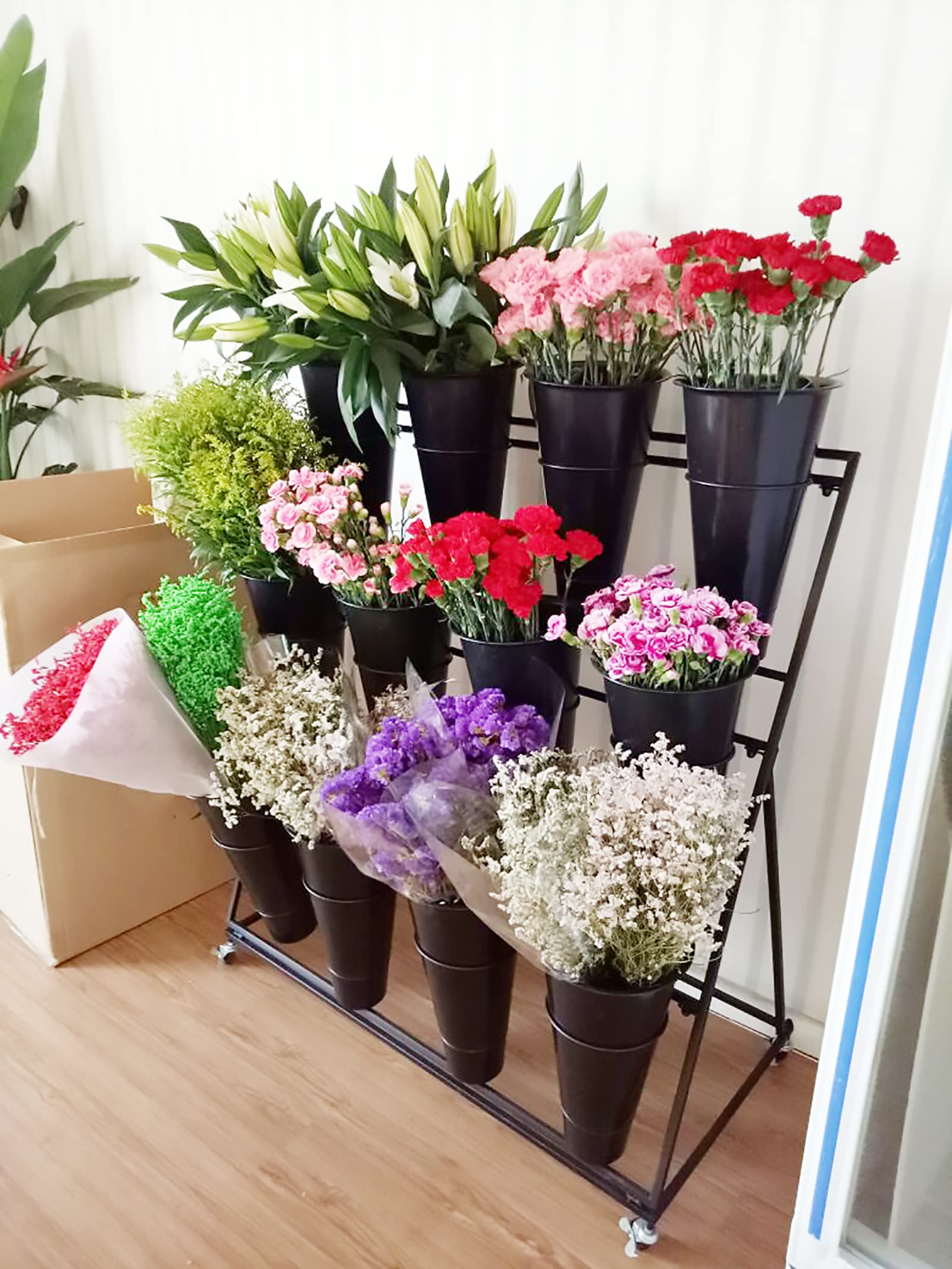 Heavy-duty florist stand with 12 removable buckets