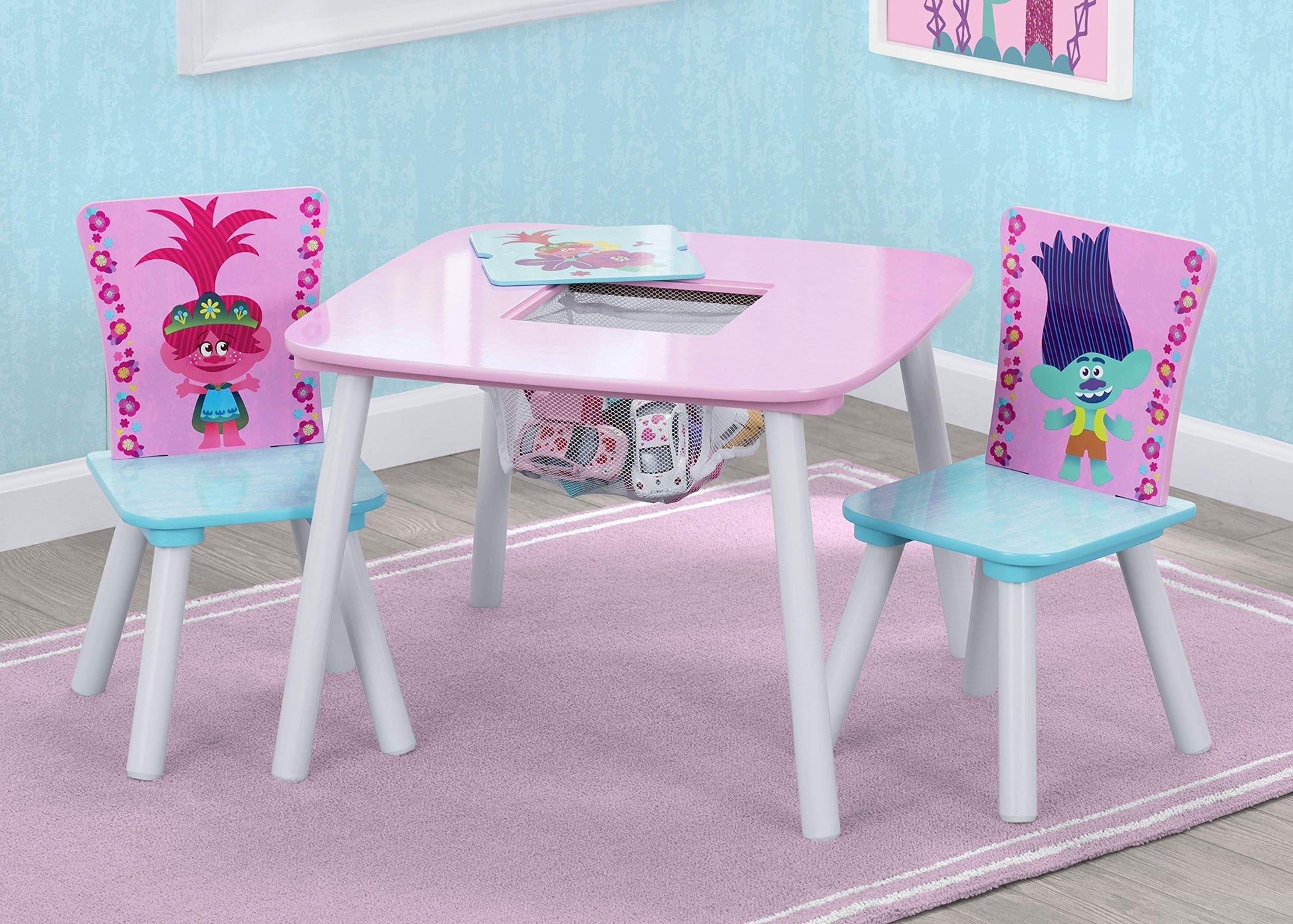 Kids art table with storage and 2 chairs, perfect for playrooms and creative activities.