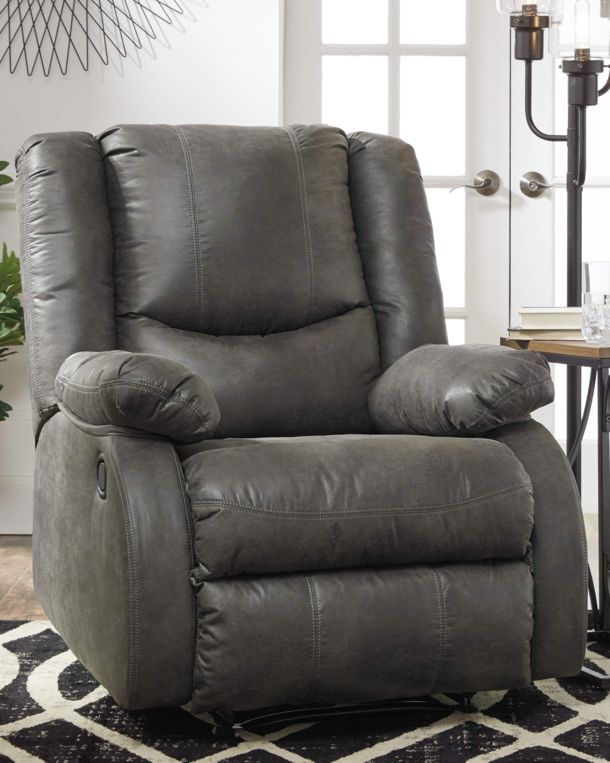 Side Angle of Faux Leather Recliner in Slate with Pull-Tab Recline