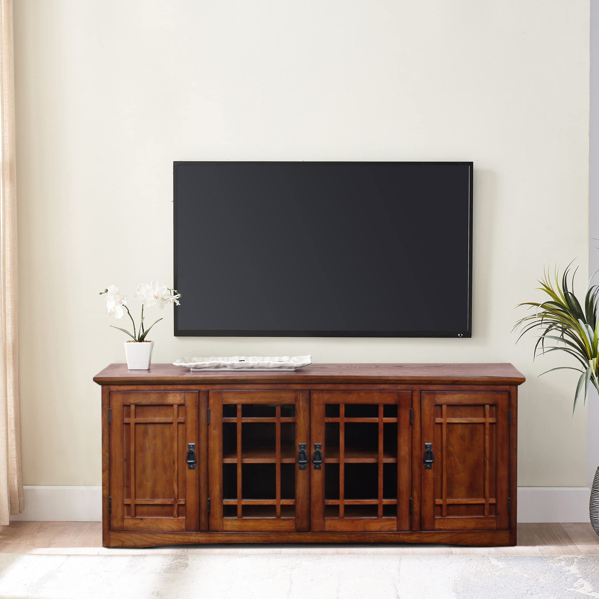 65” TV stand with tempered glass doors and blackened hardware.
