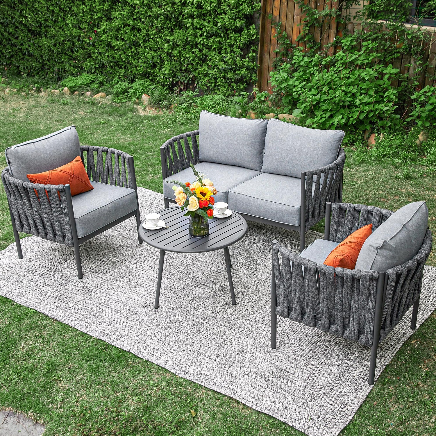 Top-down view of 4-piece outdoor set in grey setup on patio