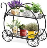 Vintage-style black metal plant stand with decorative wheels