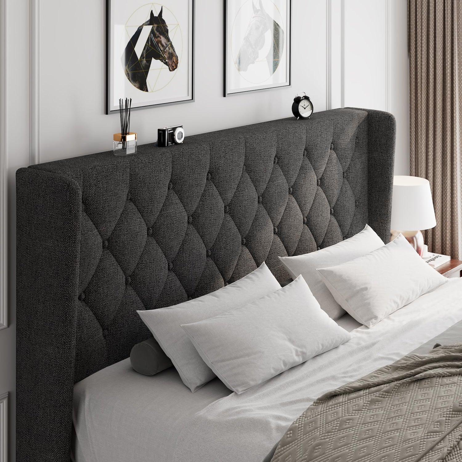 Elegant king-size bed with tall, tufted upholstered headboard in dark fabric